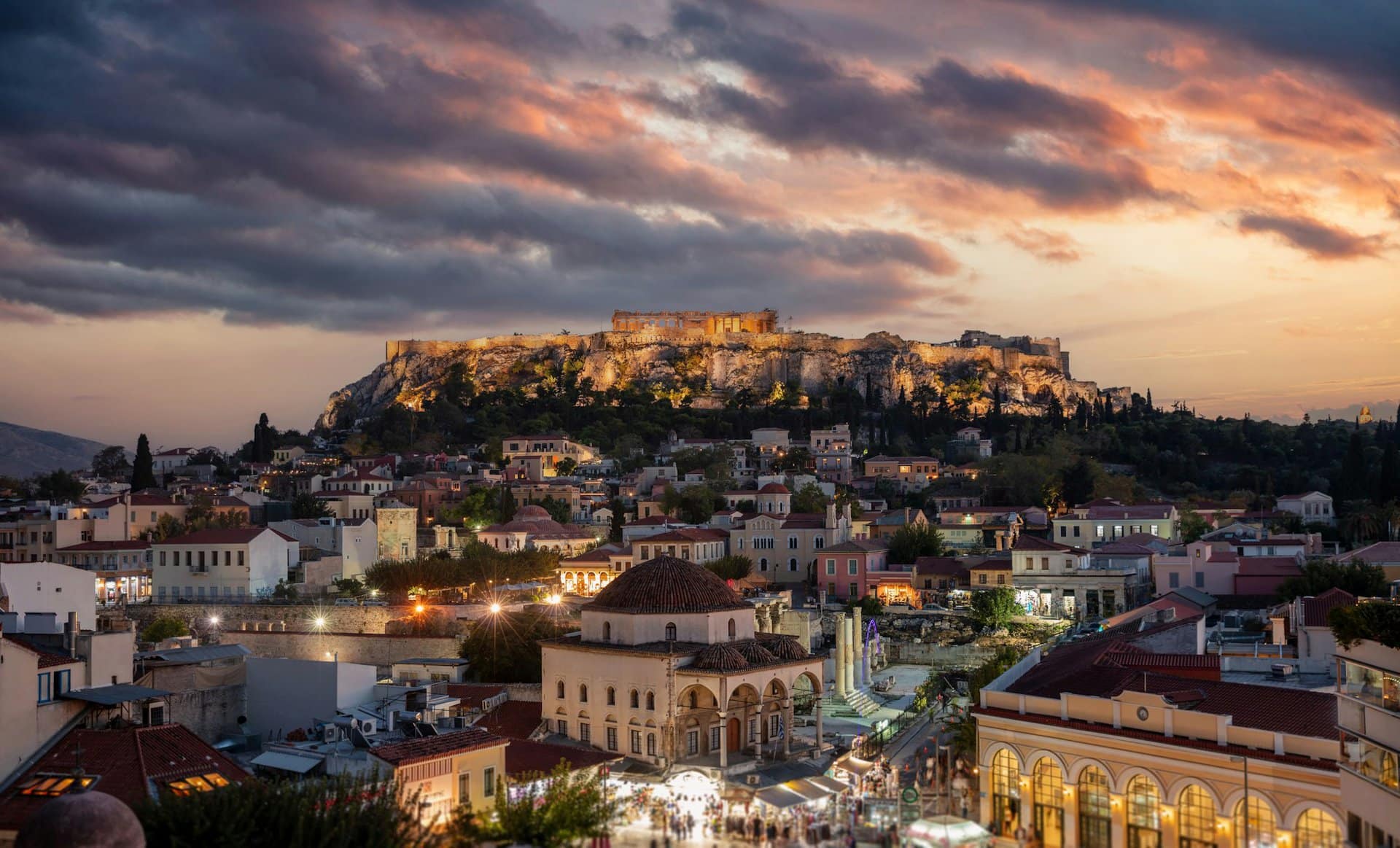Athens, Greece. Aerial panoramic view of Monastiraki square and the Acropolis at sunset,